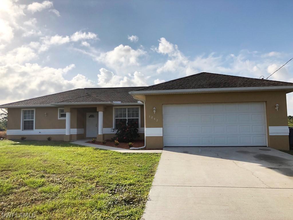 1242 Cellini St., Lehigh Acres, FL 33974