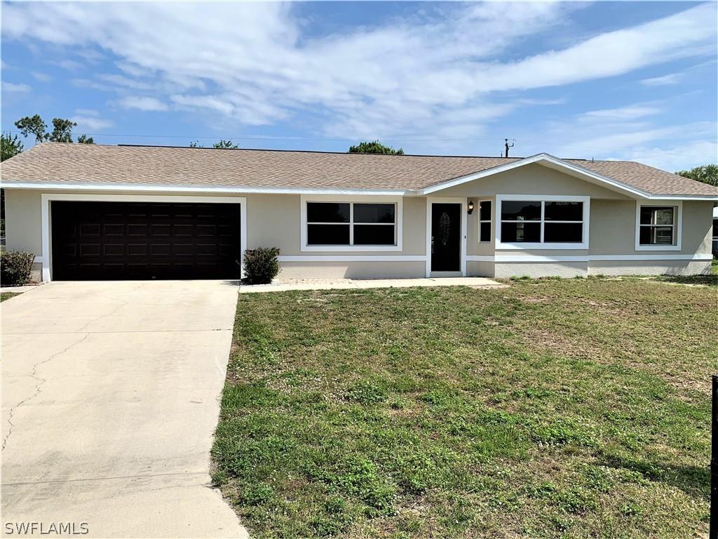 119 Dania Cir., Lehigh Acres, FL 33936
