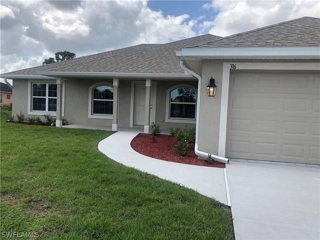 316 Palisades Ave., Lehigh Acres, FL 33974