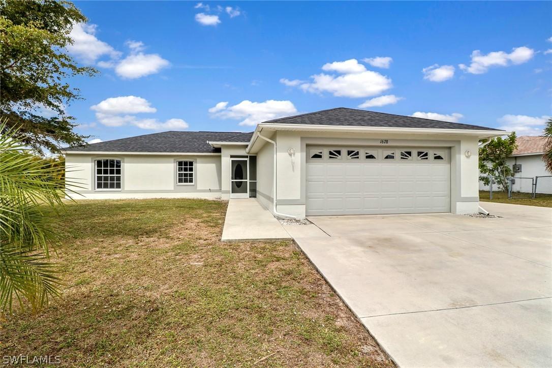 1628 Cheshire Cir., Lehigh Acres, FL 33936