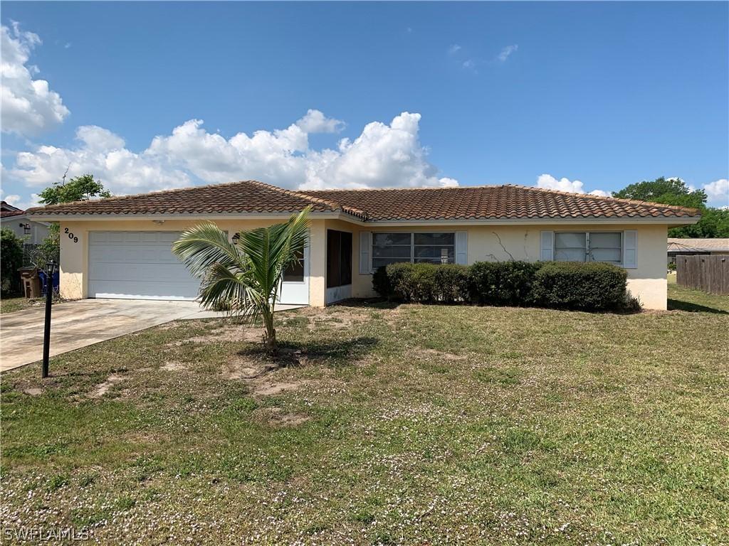 209 Lowry Ave., Lehigh Acres, FL 33936