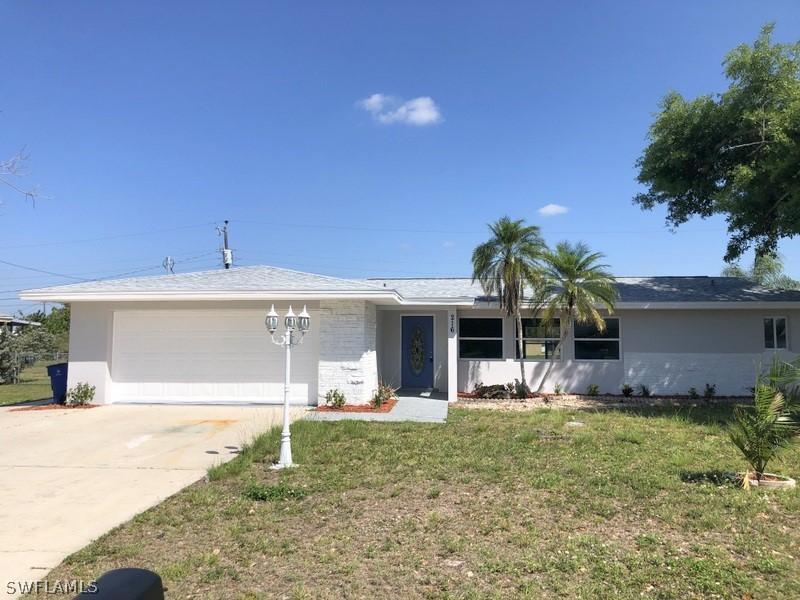 216 Fireside Ct., Lehigh Acres, FL 33936