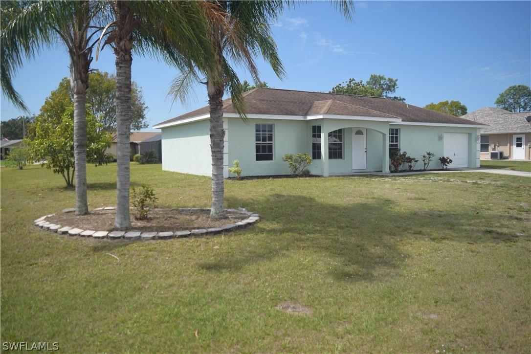 1660 Cheshire Cir., Lehigh Acres, FL 33936