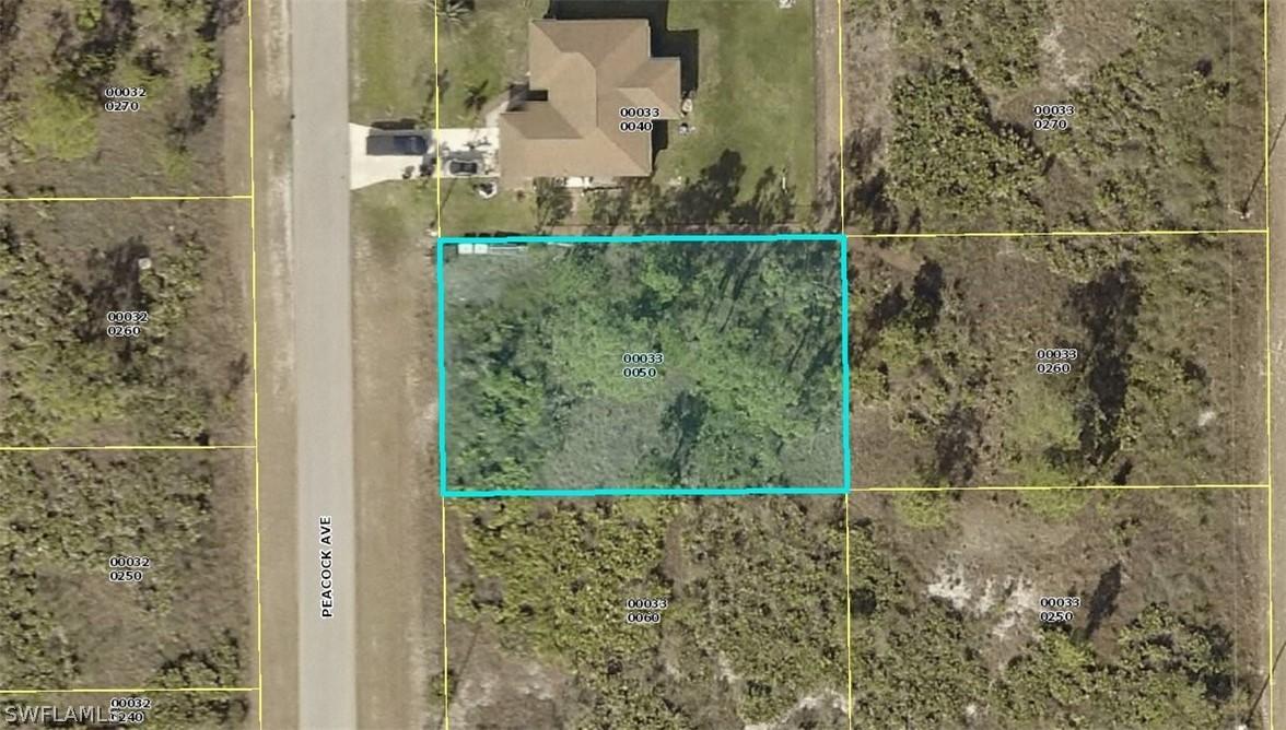 713 Peacock Ave., Lehigh Acres, FL 33974