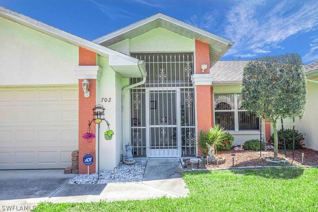 702 Jackson Ave., Lehigh Acres, FL 33972
