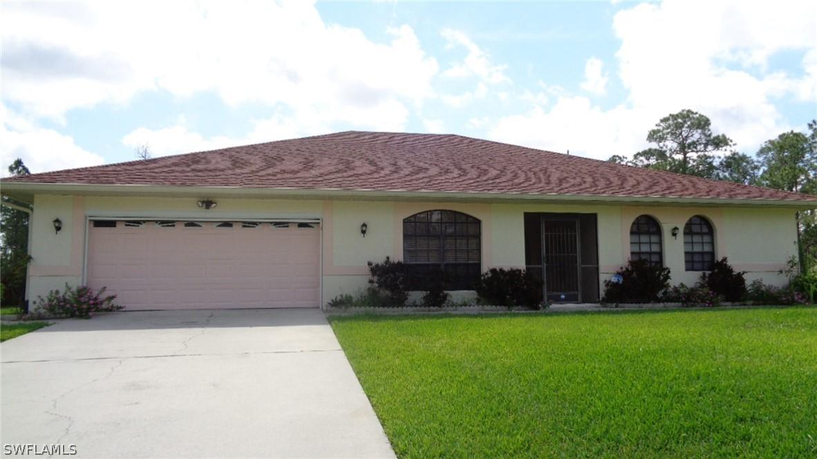 1416 Thompson Ave., Lehigh Acres, FL 33972