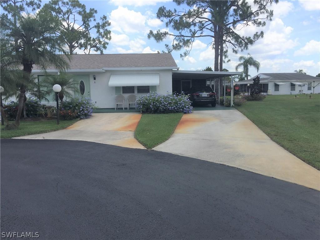 1 Desert Ash Ct., Lehigh Acres, FL 33936