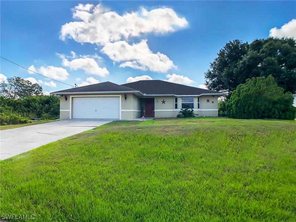 910 Adeline Ave., Lehigh Acres, FL 33971