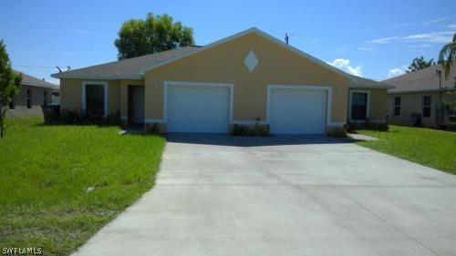 1407/1409 SE 1st Pl., Cape Coral, FL 33990