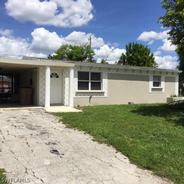 106 Apache St., Lehigh Acres, FL 33936