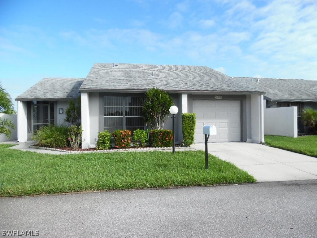 9773 Oakcrest Ct., Lehigh Acres, FL 33936