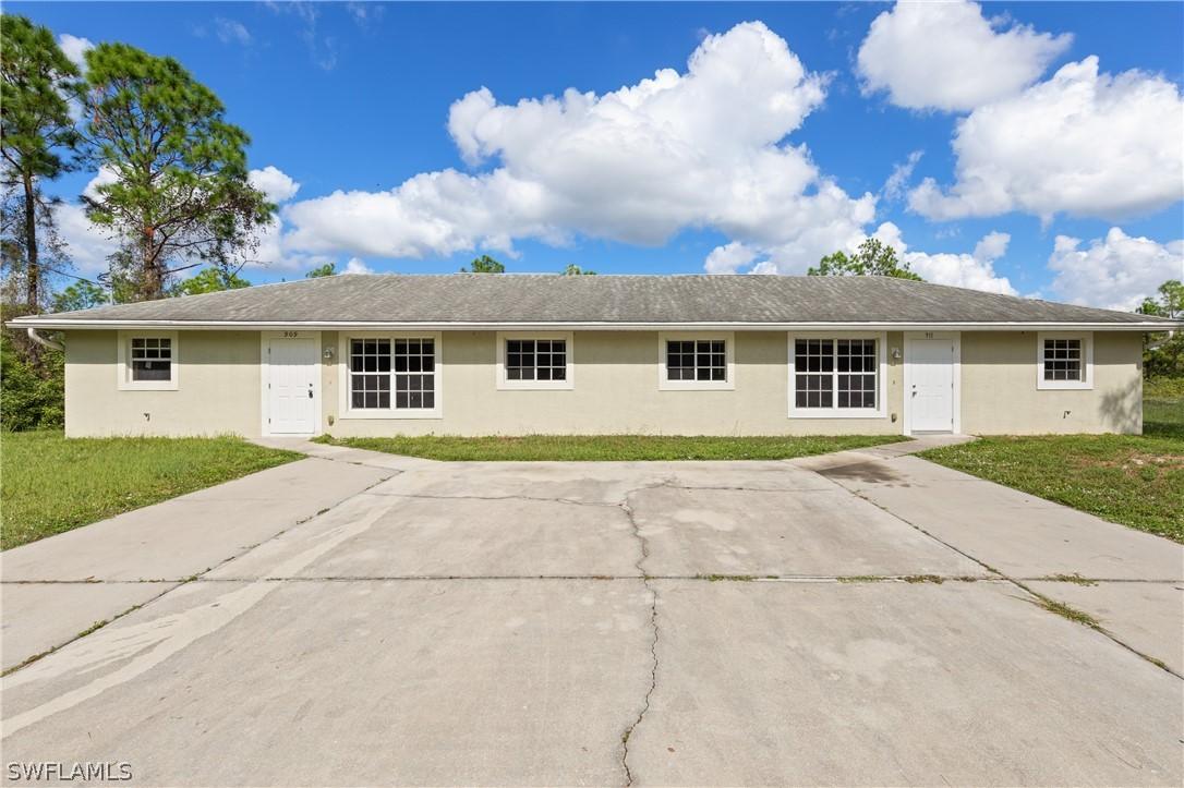 909/911 E 12th St., Lehigh Acres, FL 33972