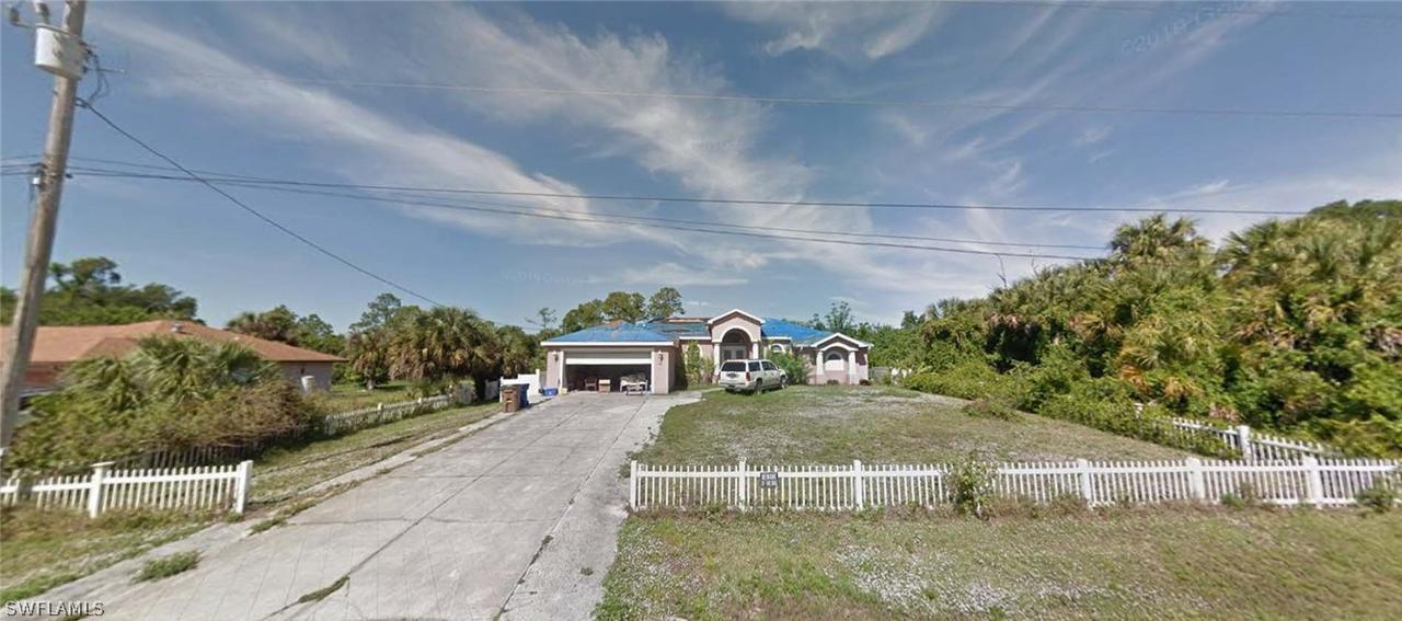 411 Cortez Ave., Lehigh Acres, FL 33972