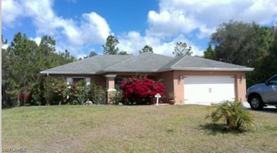 403 Jaguar Blvd., Lehigh Acres, FL 33974