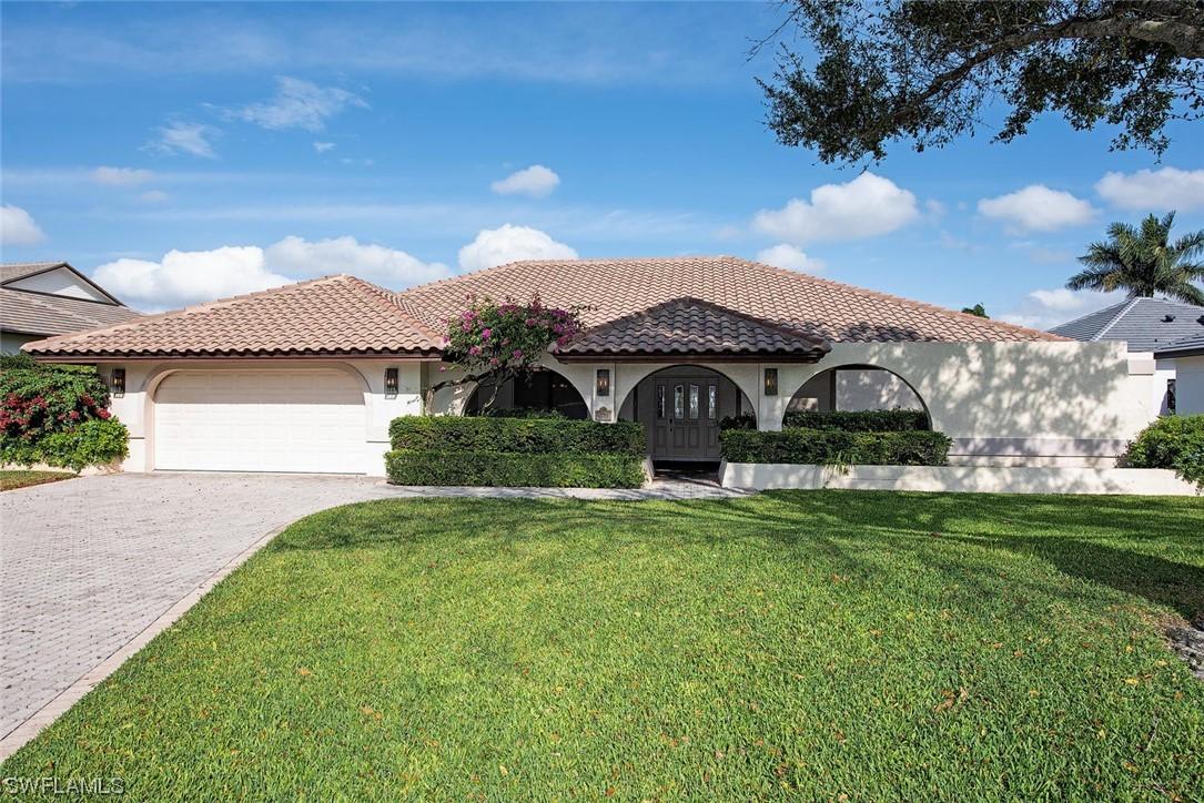 6598 Ridgewood Dr., Naples, FL 34108