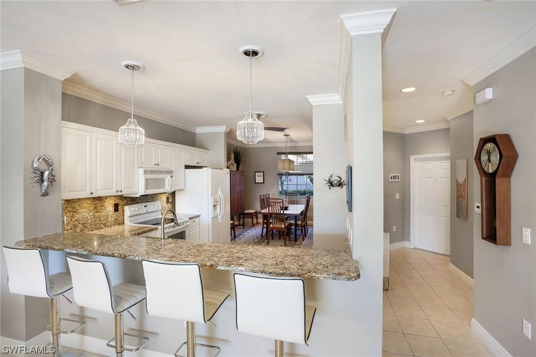 6265 Wilshire Pines Cir. #1103, Naples, FL 34109