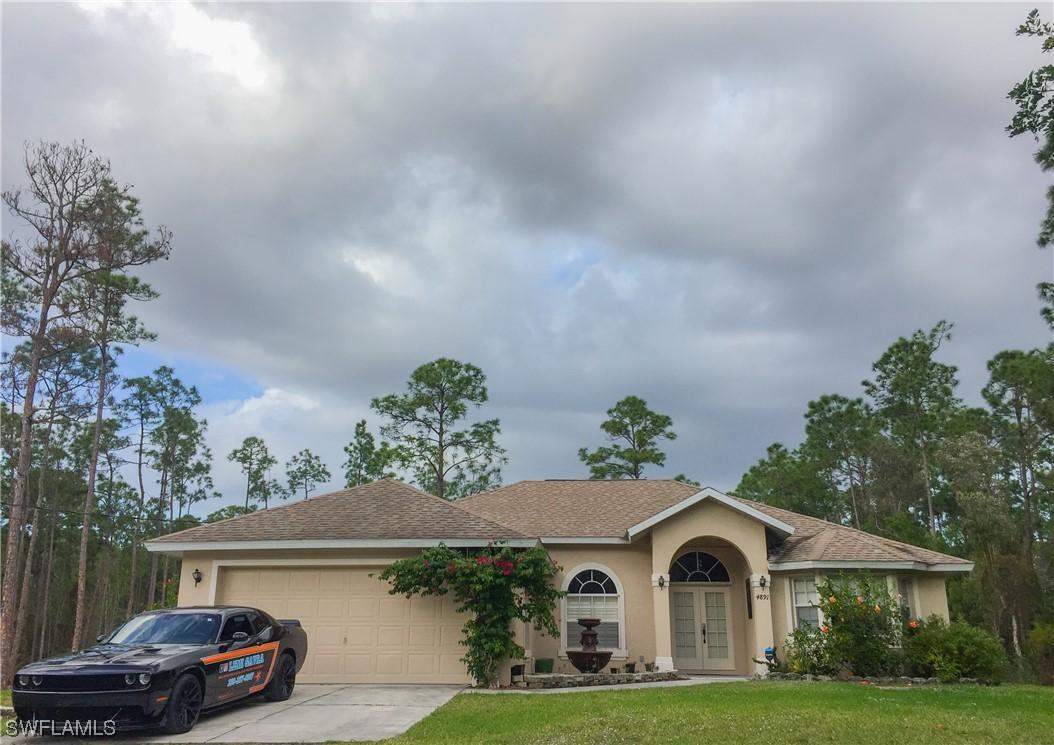 4891 Hickory Wood Dr., Naples, FL 34119