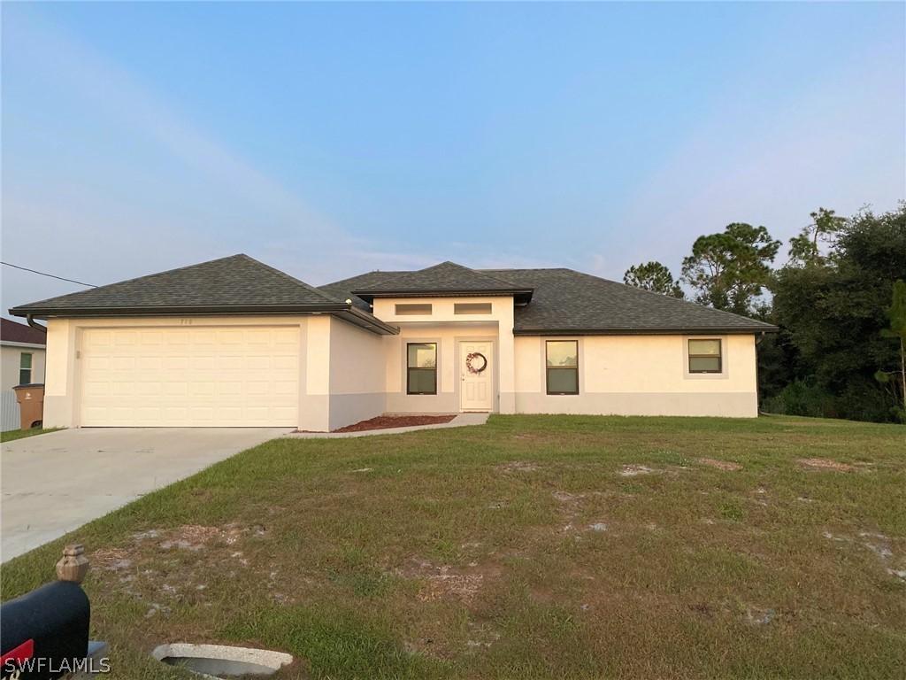 718 Plumosa Ave., Lehigh Acres, FL 33972