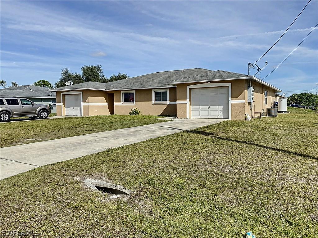 309-311 Ivan Ave., Lehigh Acres, FL 33973