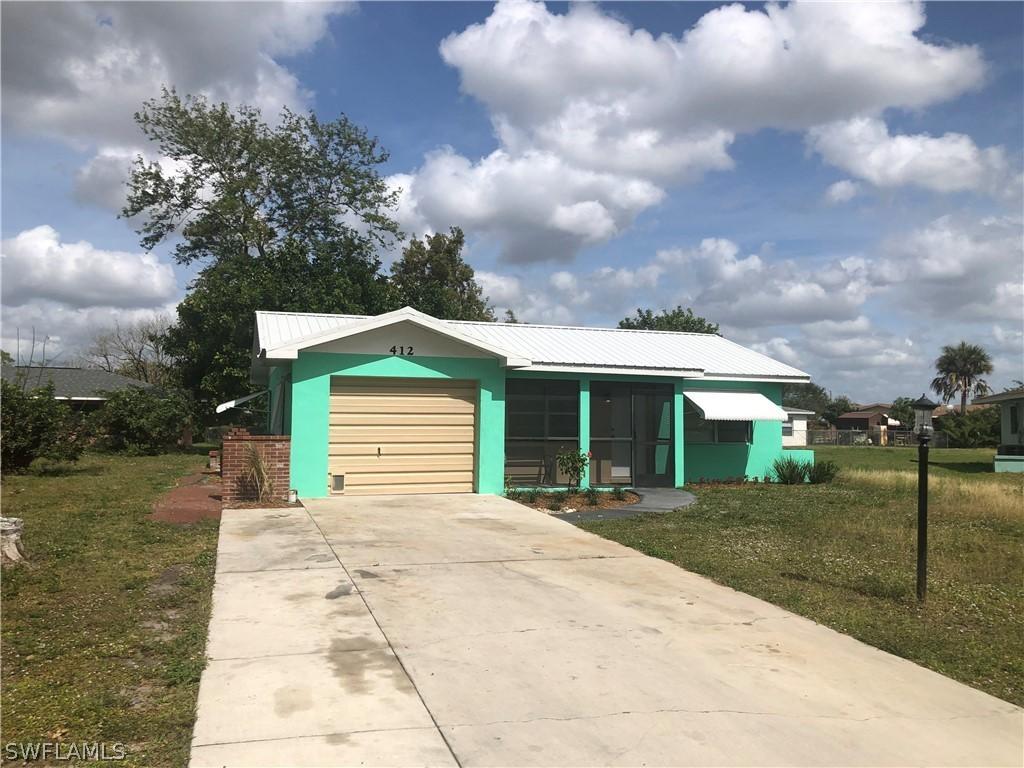 412 Cactus Cir., Lehigh Acres, FL 33936