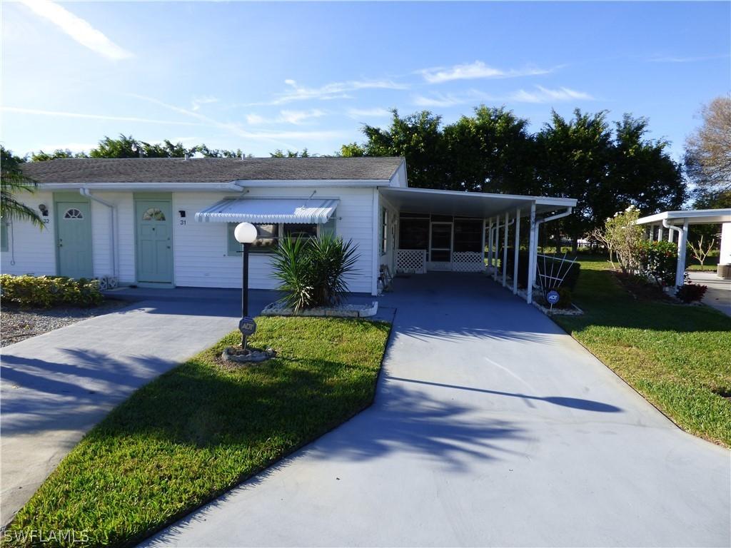 31 Dawn Flower Cir., Lehigh Acres, FL 33936