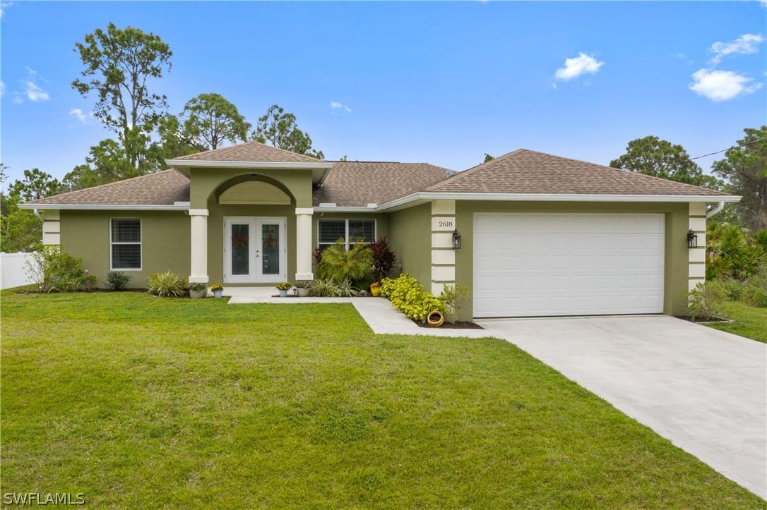 2618 Carol Pl., Lehigh Acres, FL 33971