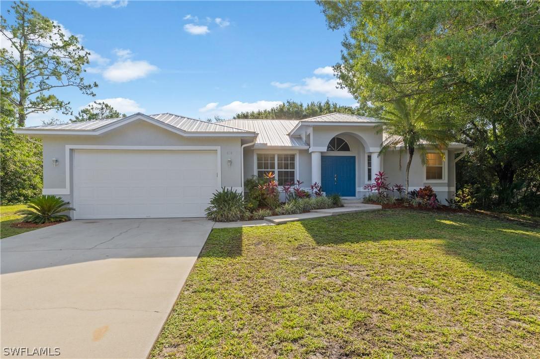 614 Poinsettia Ave., Lehigh Acres, FL 33972