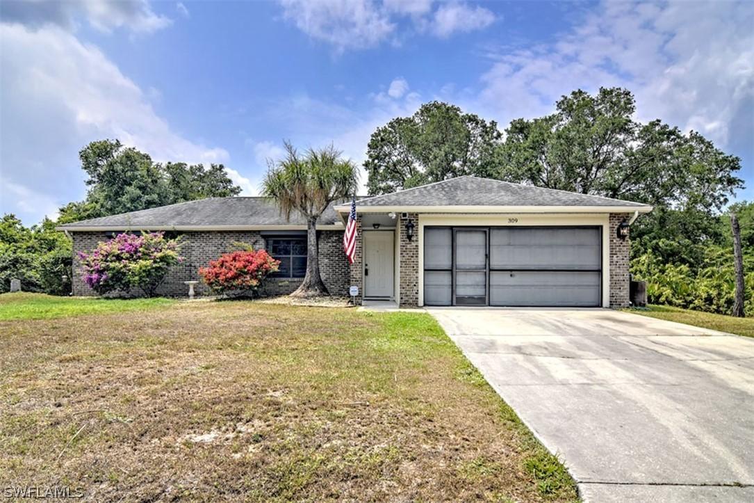 309 Wellington Ave., Lehigh Acres, FL 33936