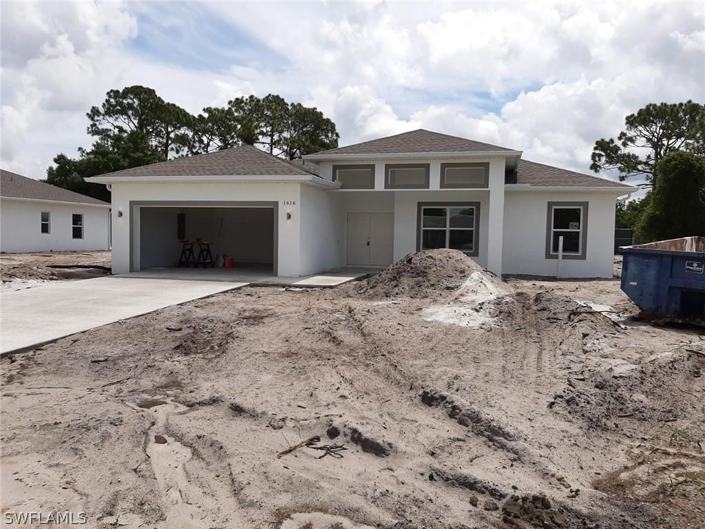 1618 Cheshire Cir., Lehigh Acres, FL 33936