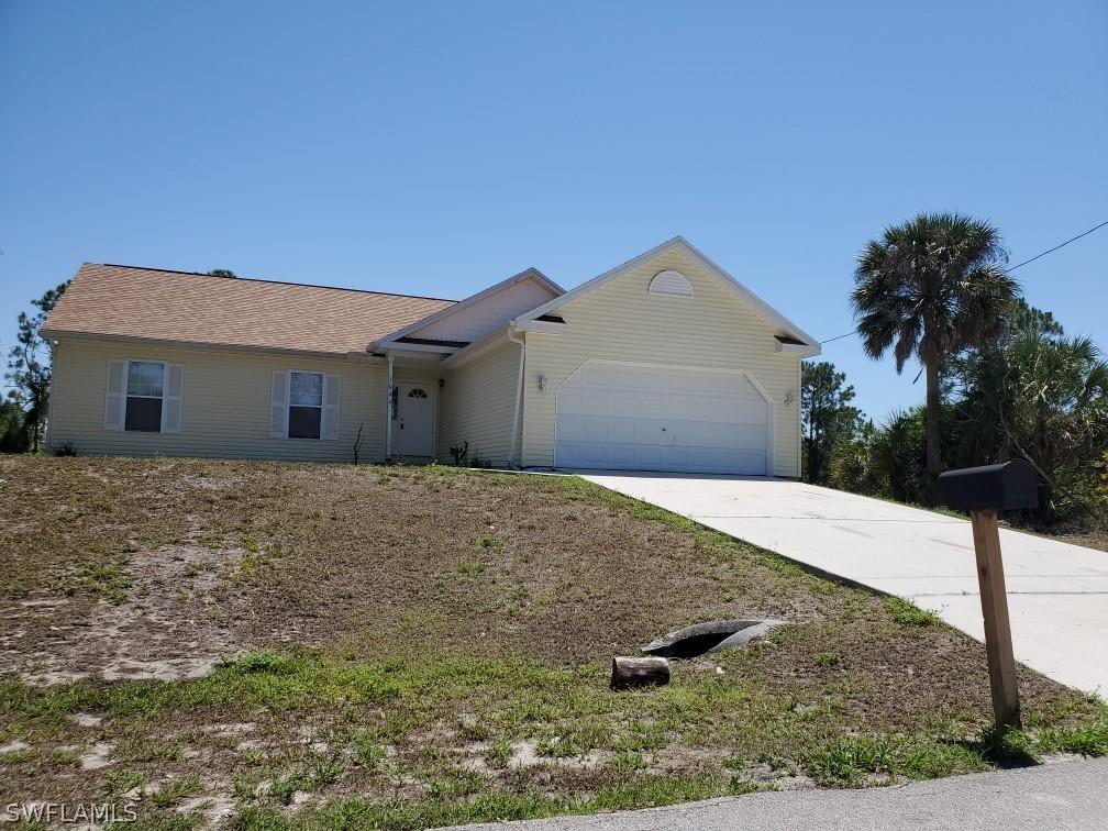 1044 Kanuga St., Lehigh Acres, FL 33974