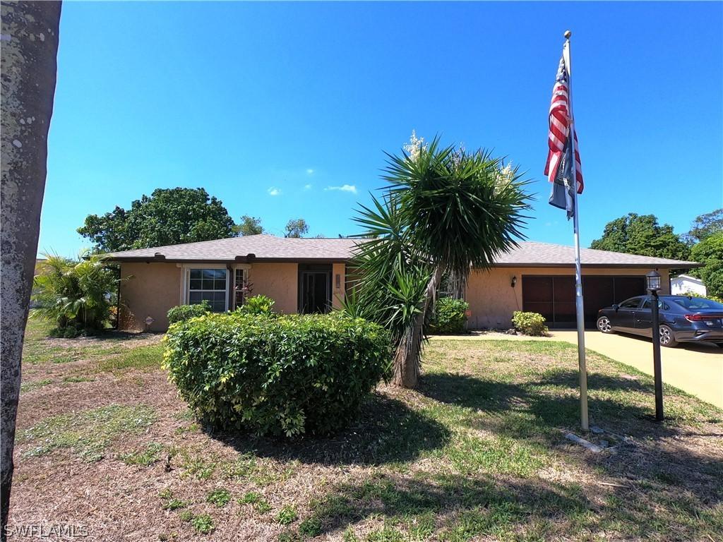 206 Tree Swallow Ct., Lehigh Acres, FL 33936