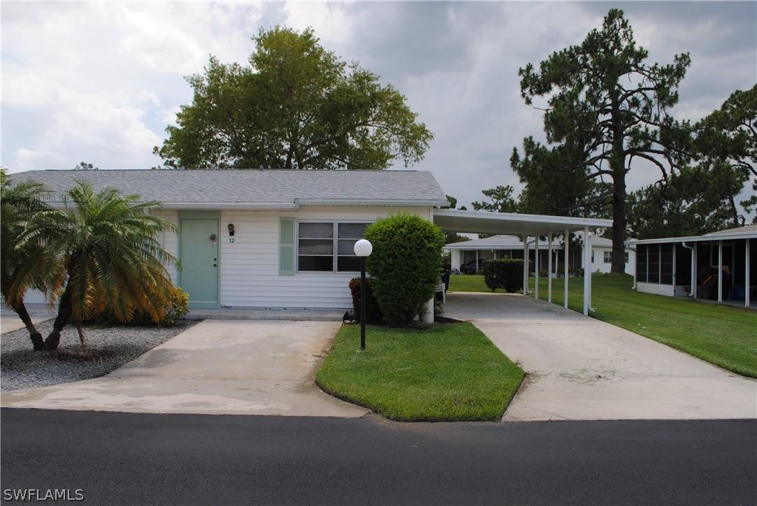 12 Dawn Flower Cir., Lehigh Acres, FL 33936