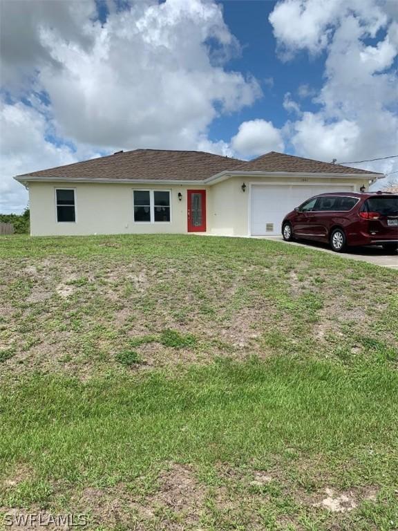 1041 Cedartree Ave., Lehigh Acres, FL 33971