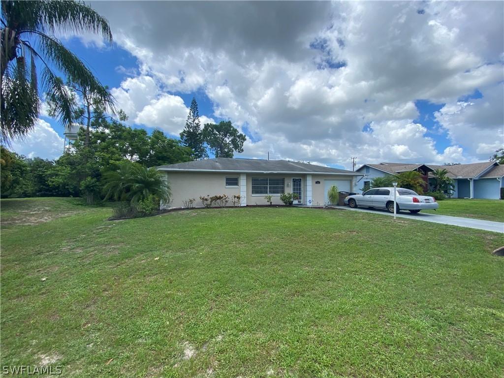 704 Adams Ave., Lehigh Acres, FL 33936