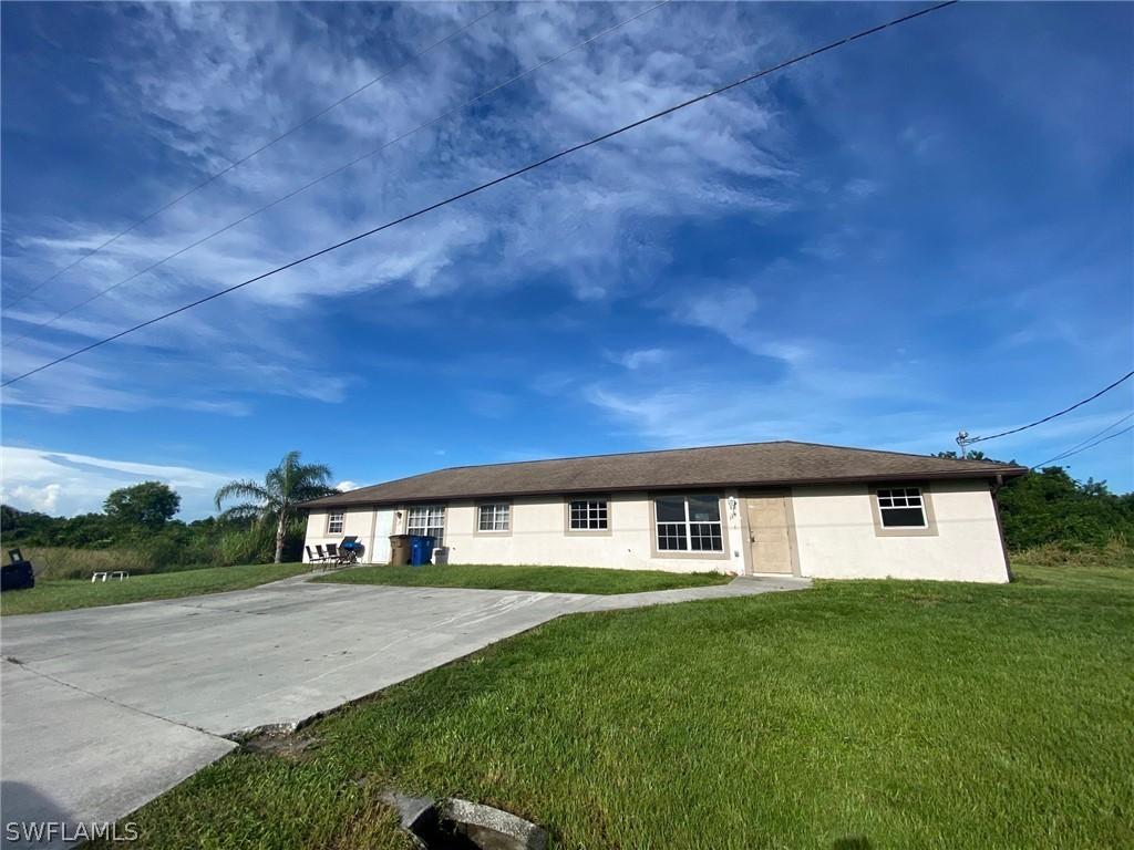 124/126 Harry Ave., Lehigh Acres, FL 33973