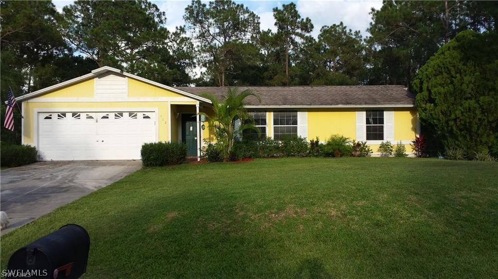 112 Louis Ave., Lehigh Acres, FL 33936