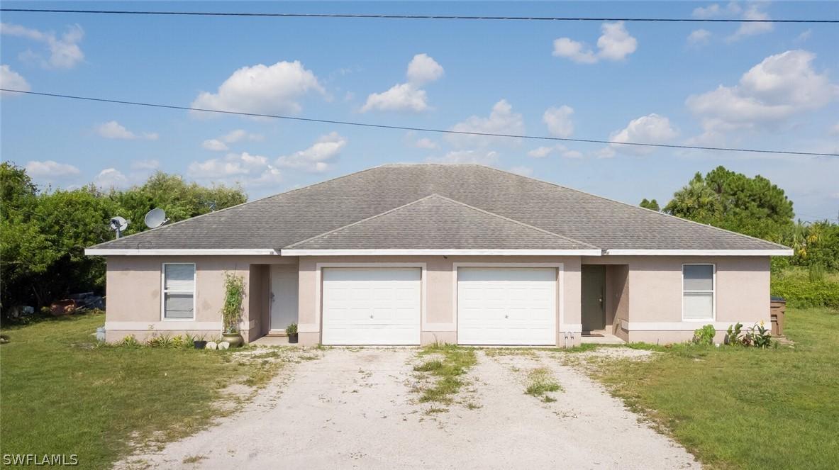 313 Ichabod Ave., Lehigh Acres, FL 33973