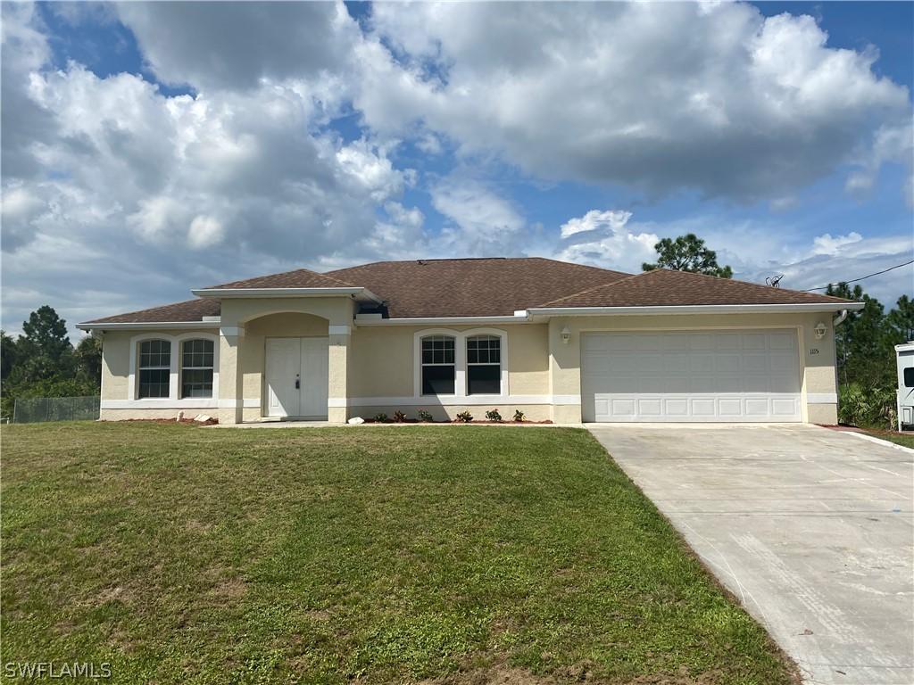 1115 Chipley St., Lehigh Acres, FL 33974