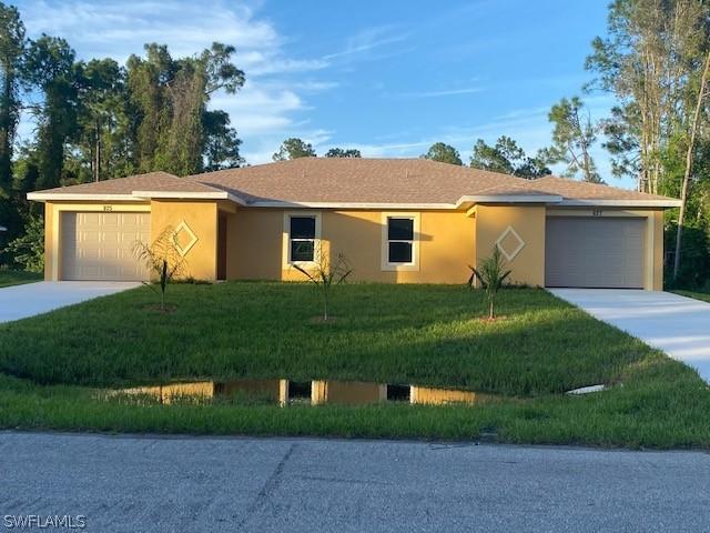 825/827 Meadow Rd., Lehigh Acres, FL 33973