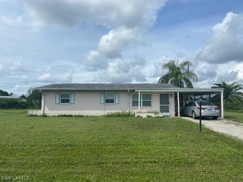 213 Canal Ct., Lehigh Acres, FL 33936