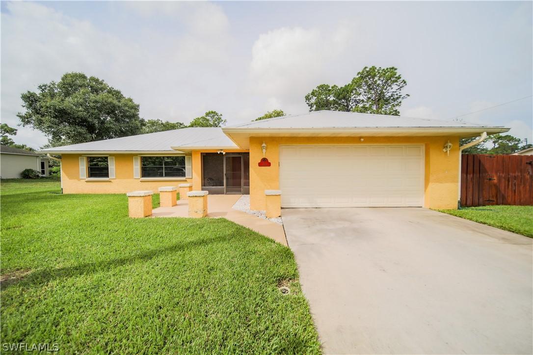 319 Lincoln Ave., Lehigh Acres, FL 33936