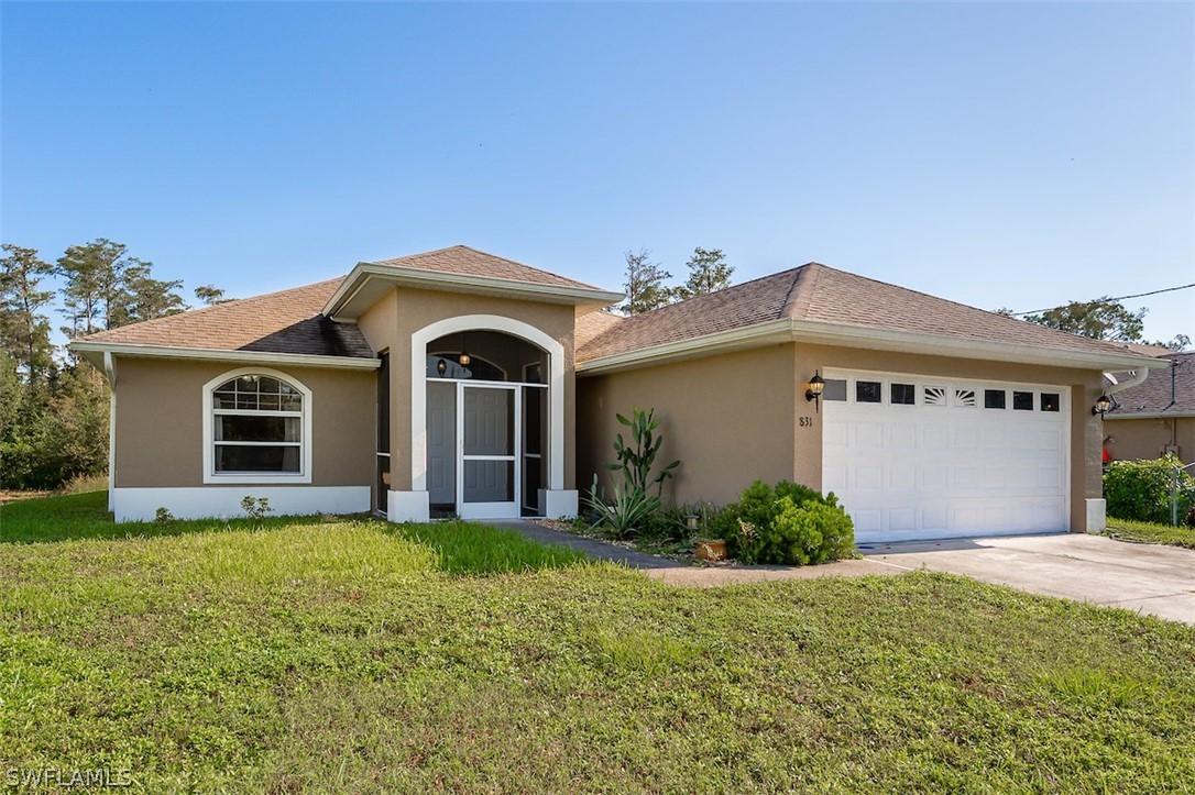 831 Hector Ln., Lehigh Acres, FL 33974
