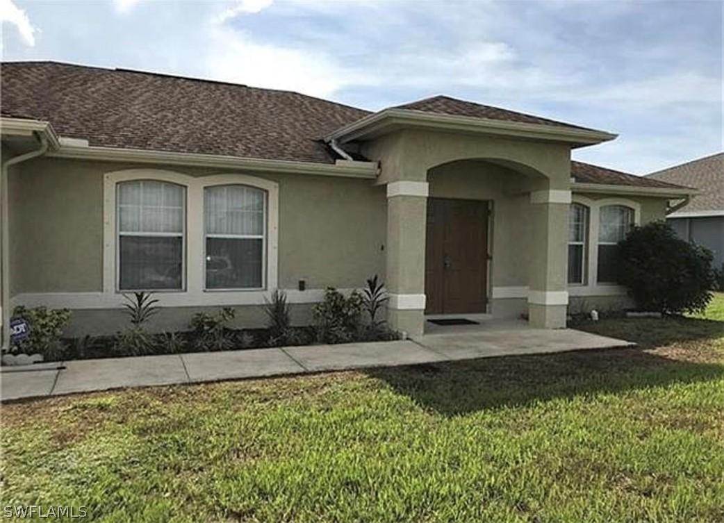 327 Rawlings Ave., Lehigh Acres, FL 33974