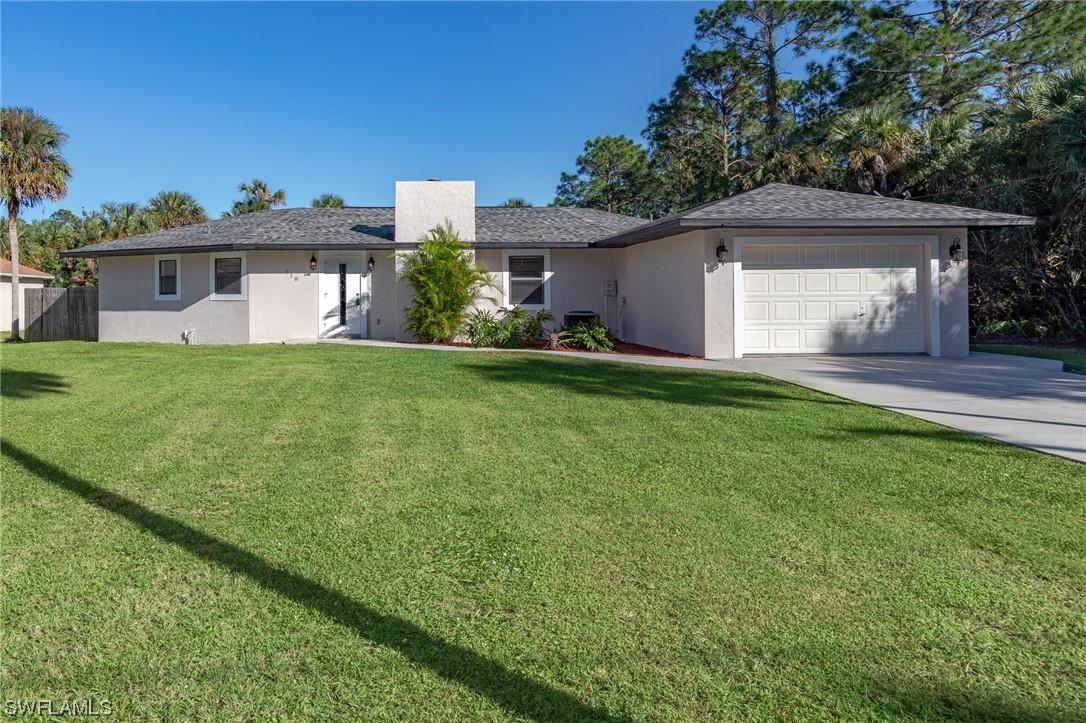 618 Cortez Ave., Lehigh Acres, FL 33972