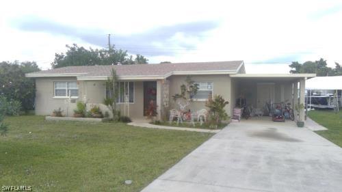 211 E Jersey Rd., Lehigh Acres, FL 33936