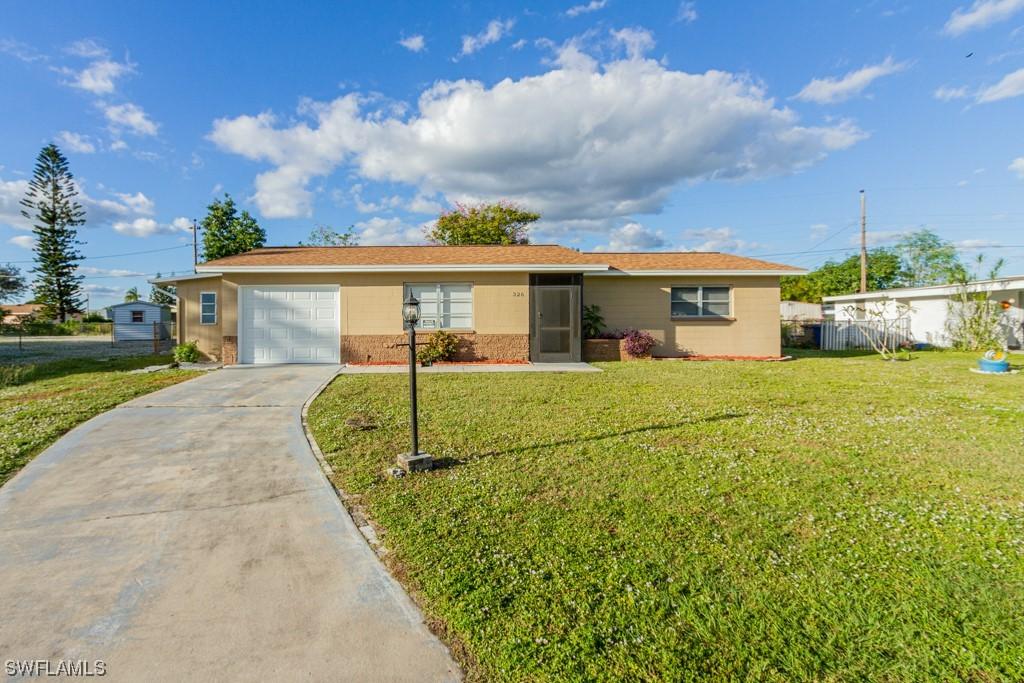 326 Morgan Cir., Lehigh Acres, FL 33936