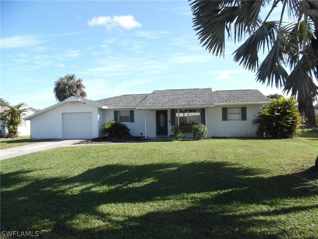 406 Cactus Cir., Lehigh Acres, FL 33936