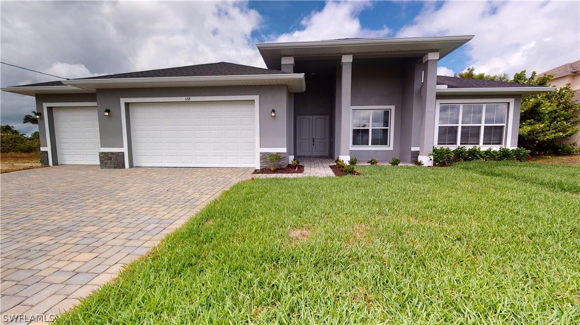 812 NW 38th Pl., Cape Coral, FL 33993