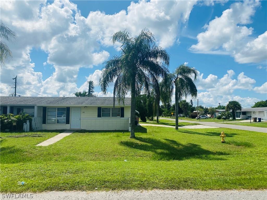 1122 Wesley St., Lehigh Acres, FL 33936