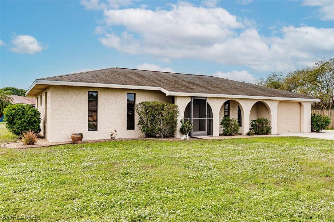 211 Ground Dove Cir., Lehigh Acres, FL 33936